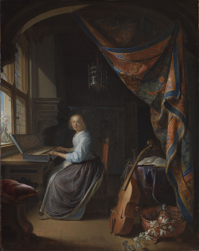 woman playing a clavichord